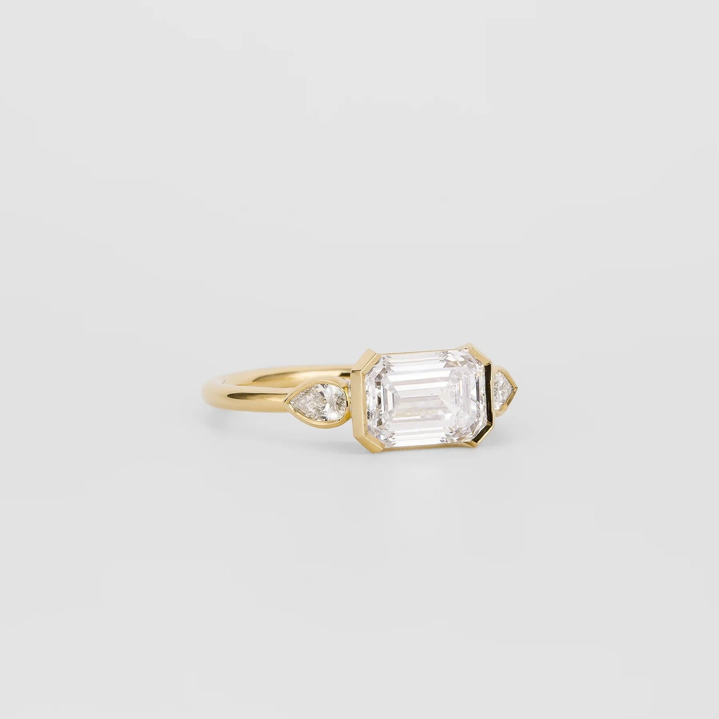 2.5 CT Emerald Shaped Three Stone Moissanite Engagement Ring