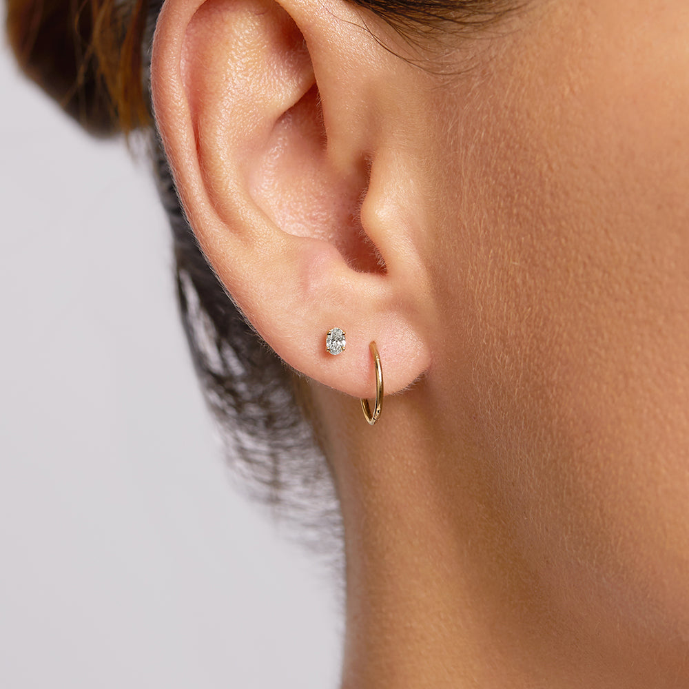 0.54 TCW Oval Shaped Moissanite Studs Earrings