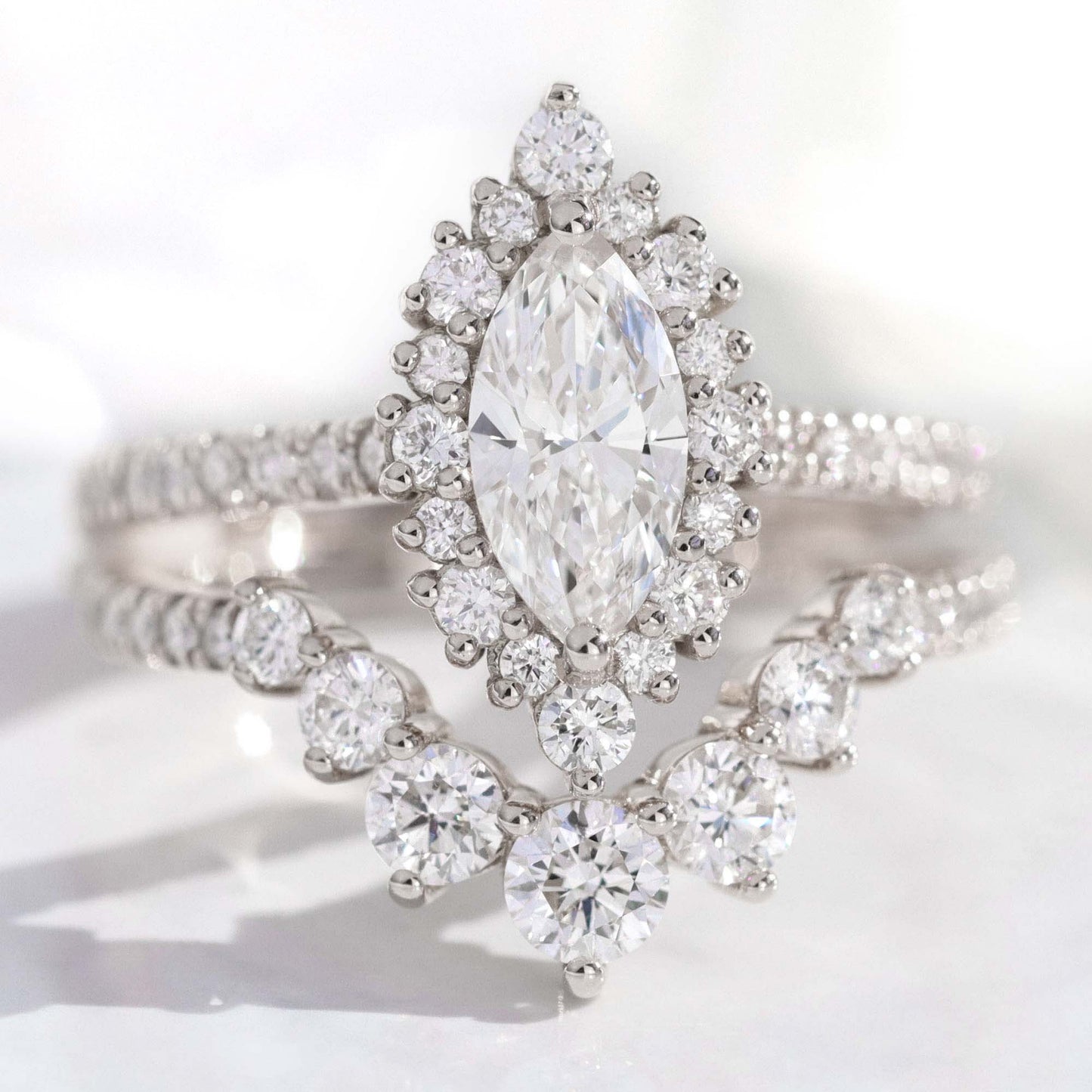 0.7 CT Marquise Cut Curved Pave Moissanite Bridal Ring Set