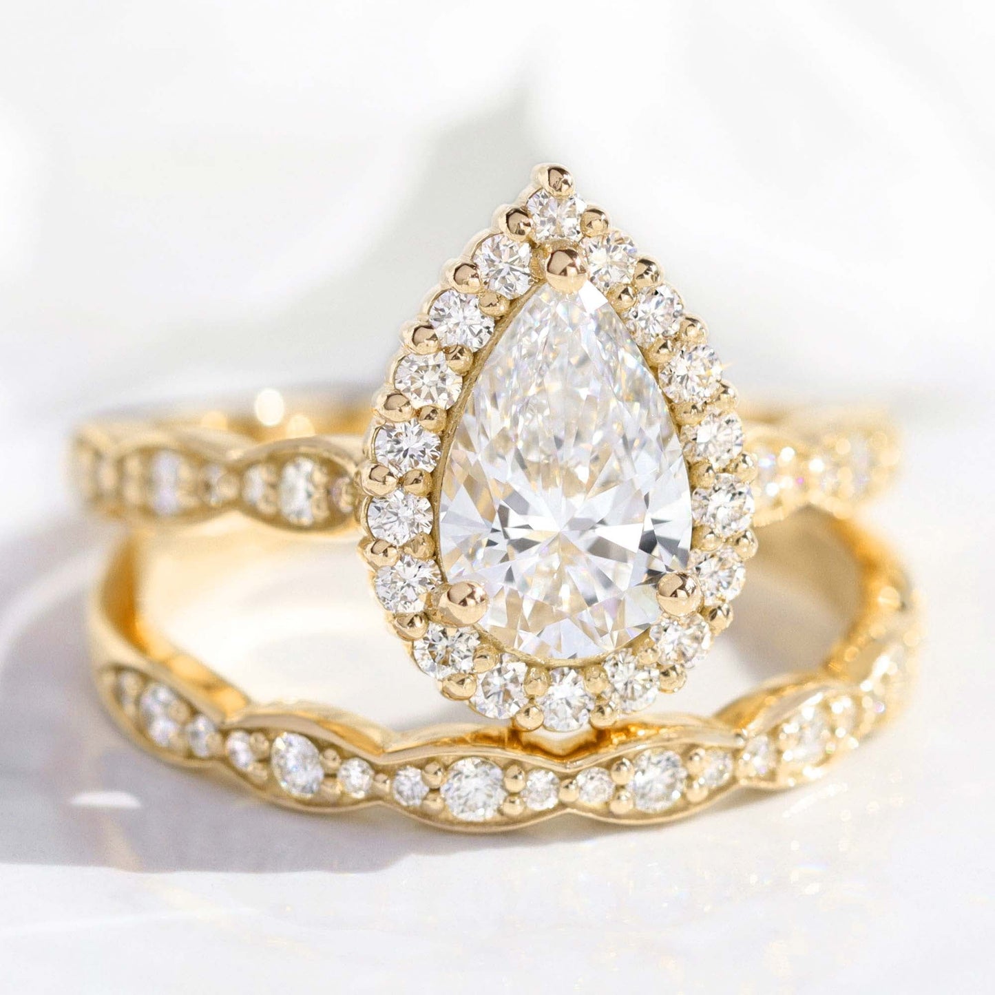 1.2 CT Pear Cut Curved Halo & Pave Moissanite Bridal Ring Set