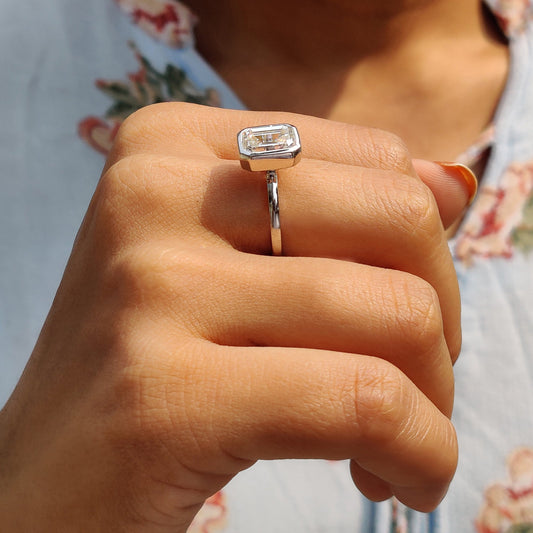 Emerald Engagement Ring With Bezel Setting