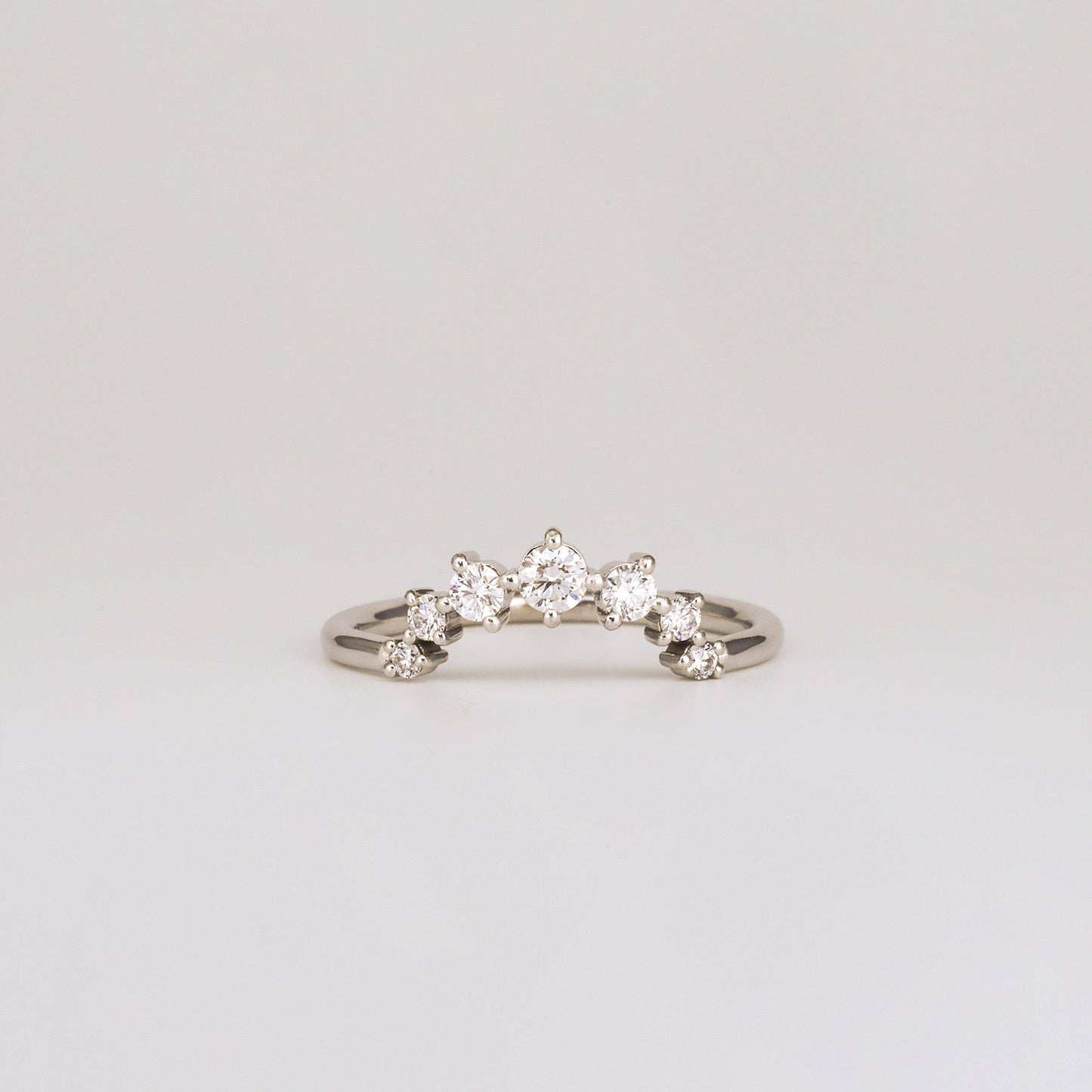 0.24 TCW Round Shaped Curved Moissanite Wedding Band