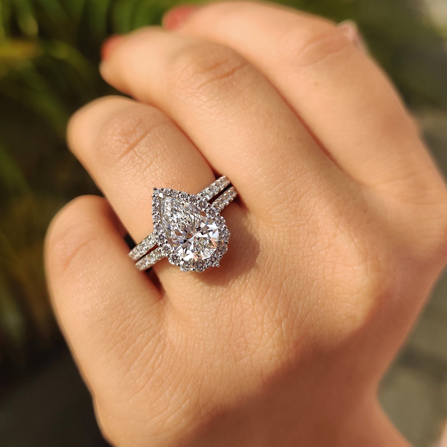 Pear Shaped Halo Engagement Ring In White Gold