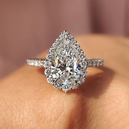 Pear Shaped Halo Engagement Ring In White Gold