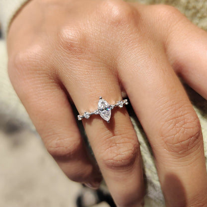 Moissanite Marquise Ring In Round Prong Setting
