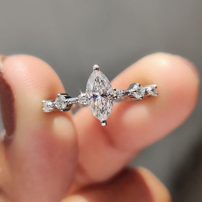Moissanite Marquise Ring In Round Prong Setting