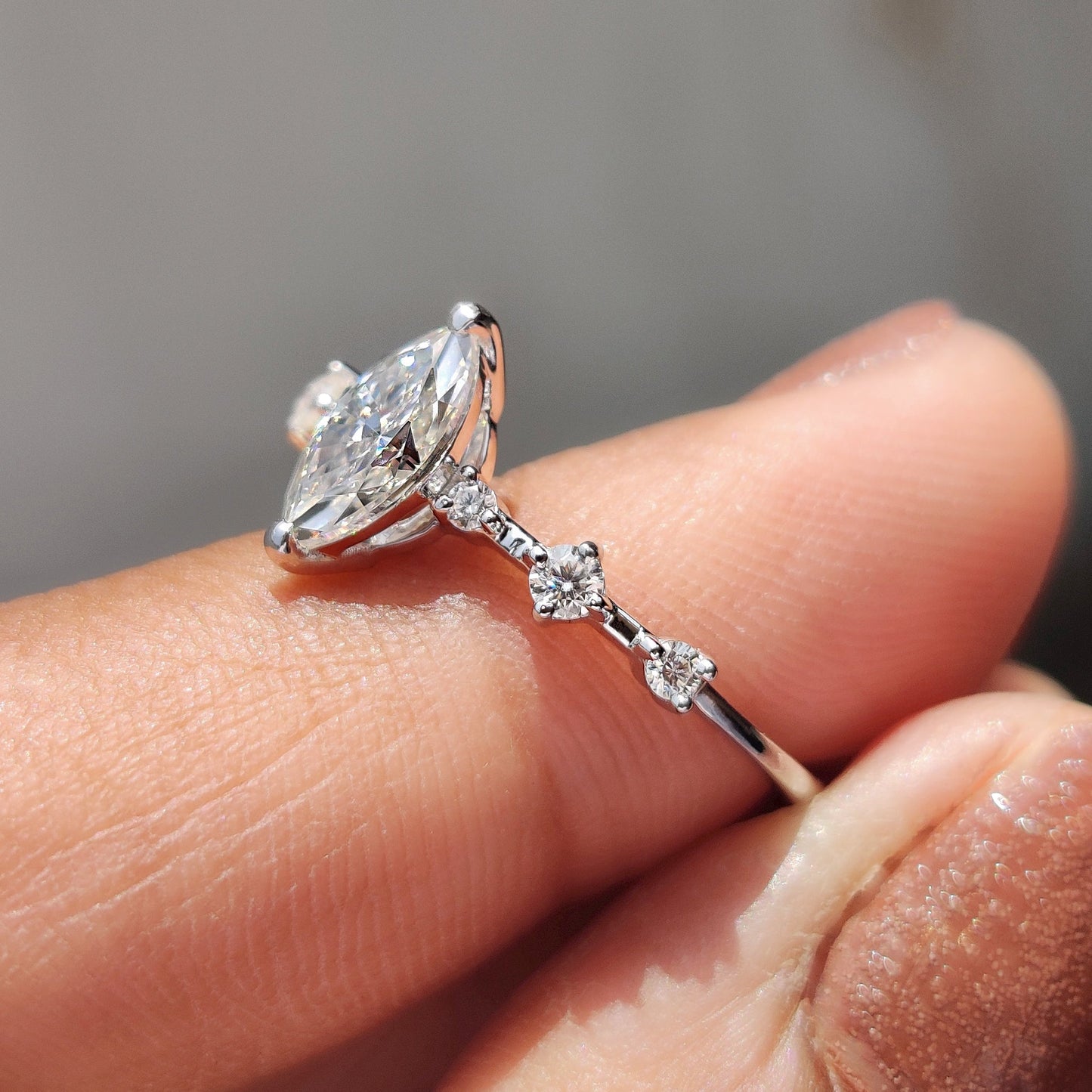 Moissanite Marquise Ring In Round Prong Setting
