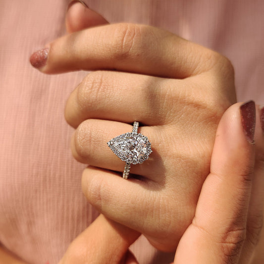 Pear Shaped Halo Engagement Ring In White Gold