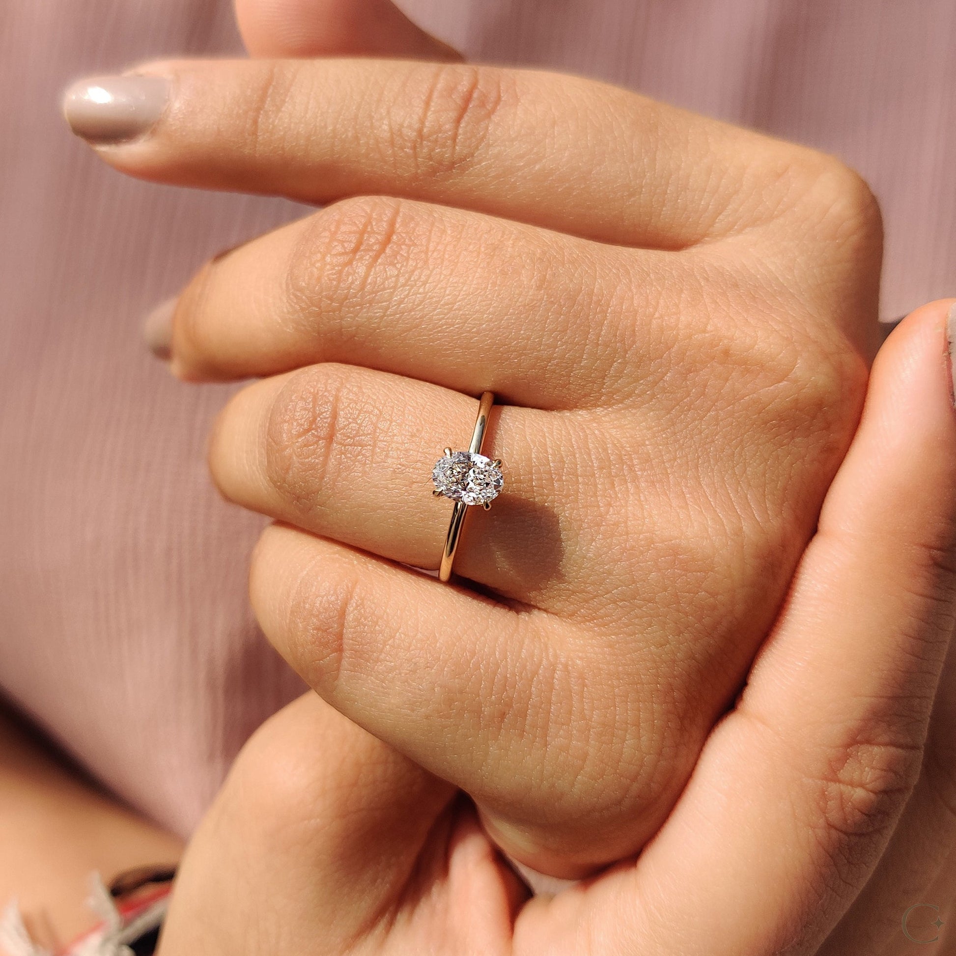 Oval Cut Diamond Ring In Solitaire Style