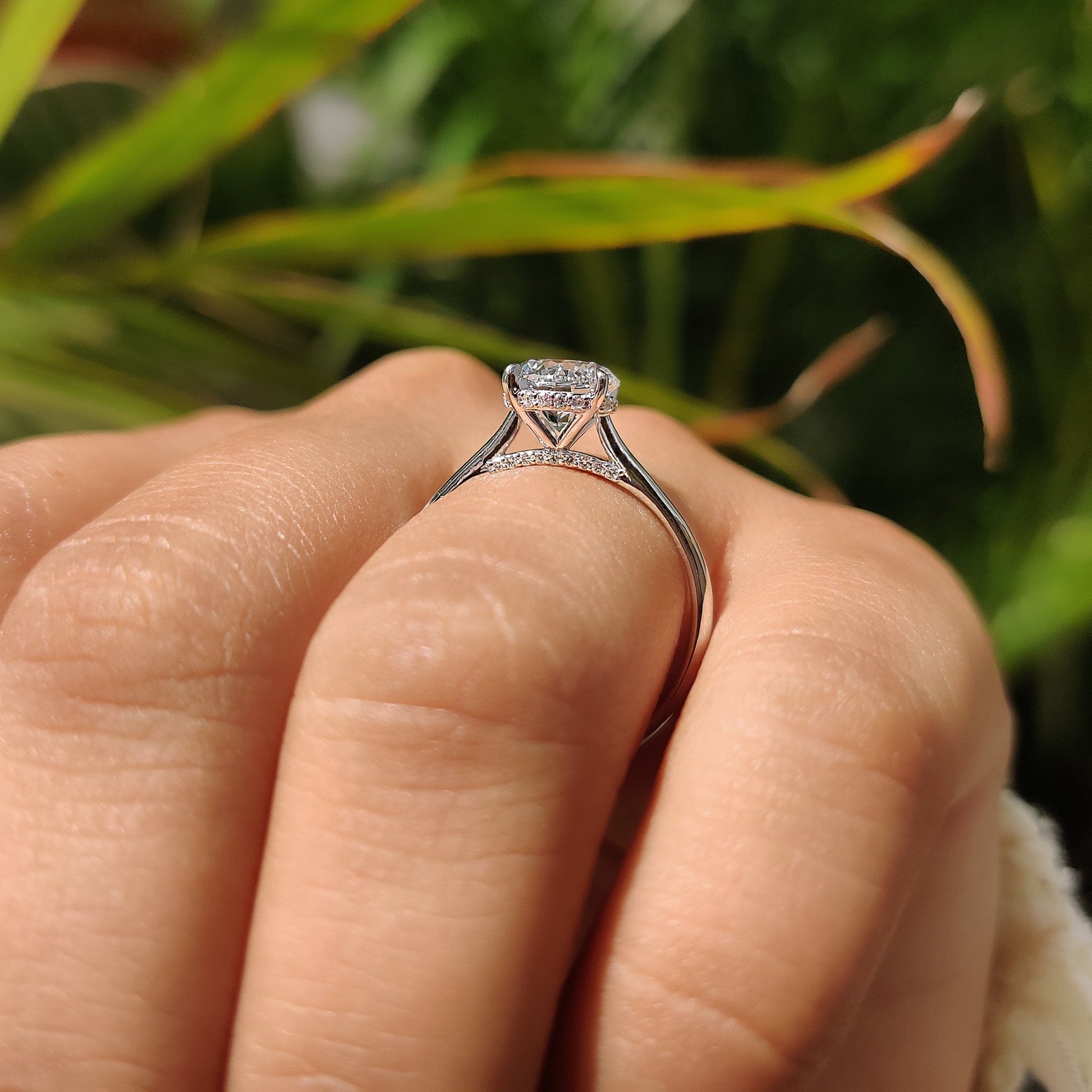 Round Cut Diamond Ring With Cathedral Setting