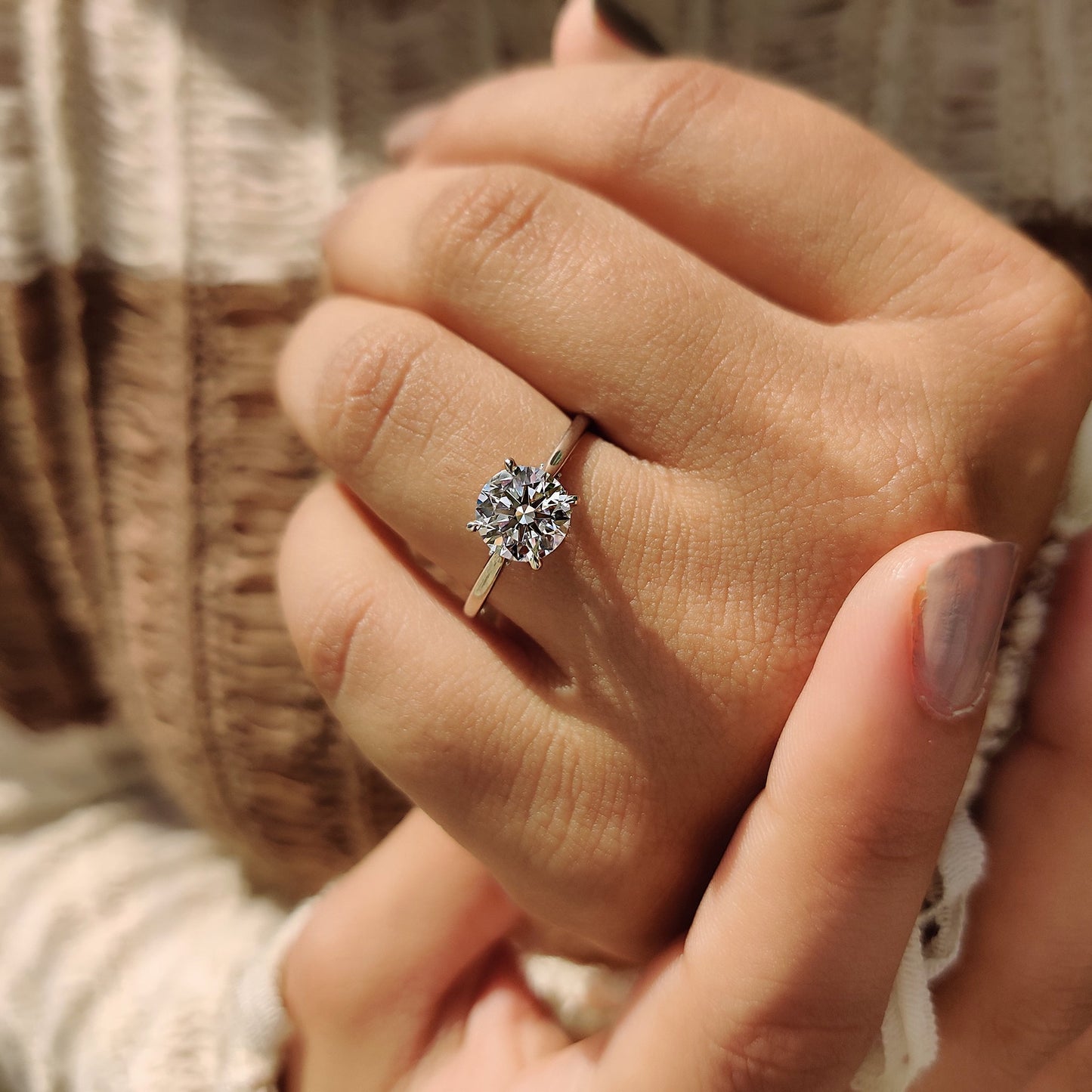 Round Cut Diamond Ring With Cathedral Setting