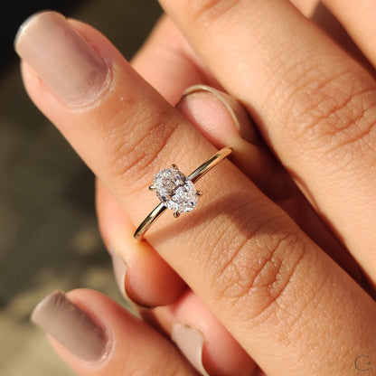 Oval Cut Diamond Ring In Solitaire Style