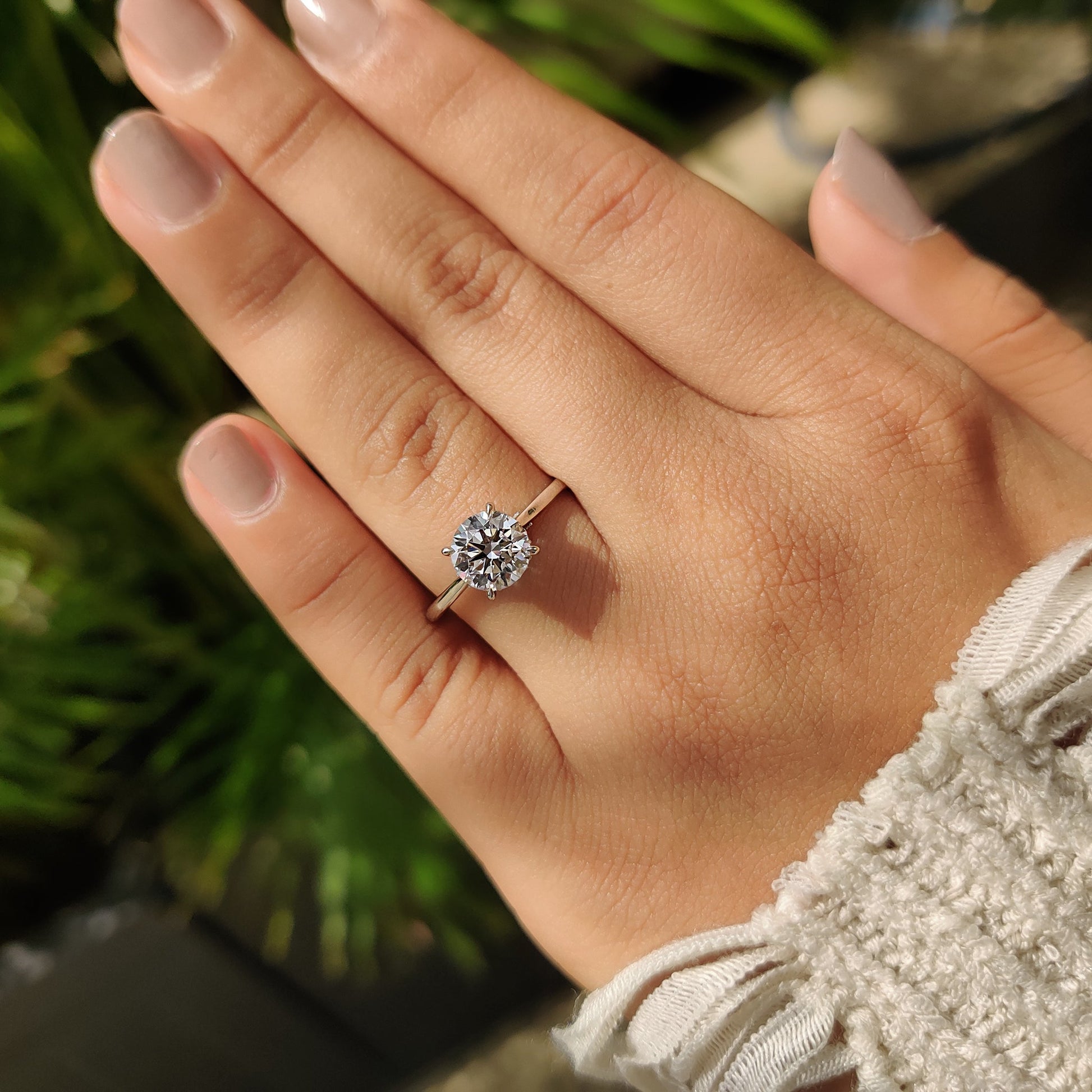 Round Cut Diamond Ring With Cathedral Setting