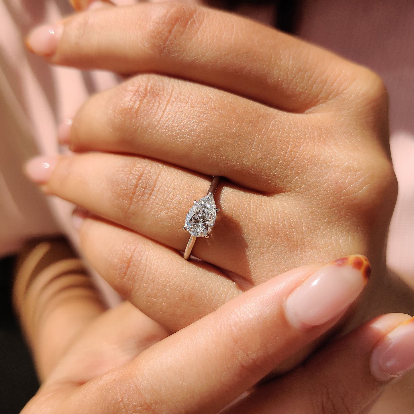 Pear Cut East To West Diamond Ring