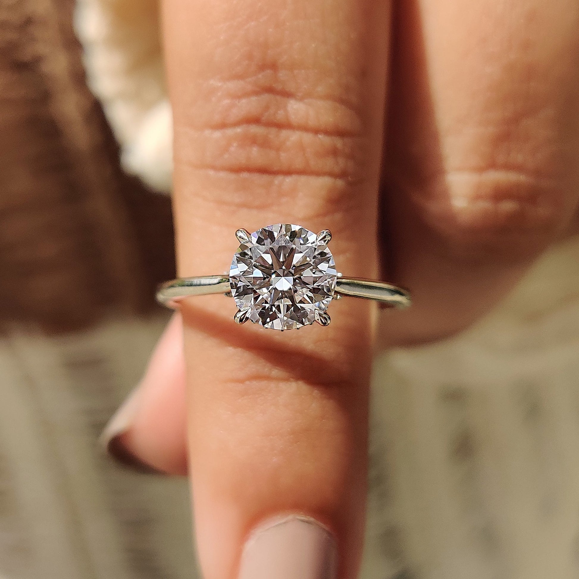 Round Cut Diamond Ring With Cathedral Setting