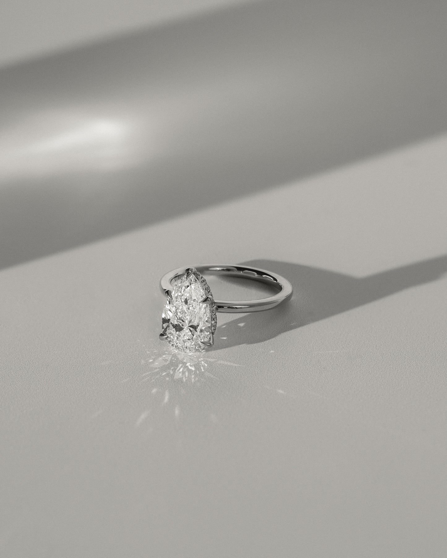 2.0 CT Pear Hidden Halo Moissanite Engagement Ring