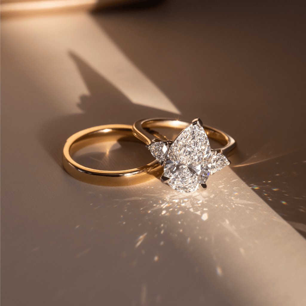 Marquise Shaped Three Stone Lab Grown Diamond Engagement Ring