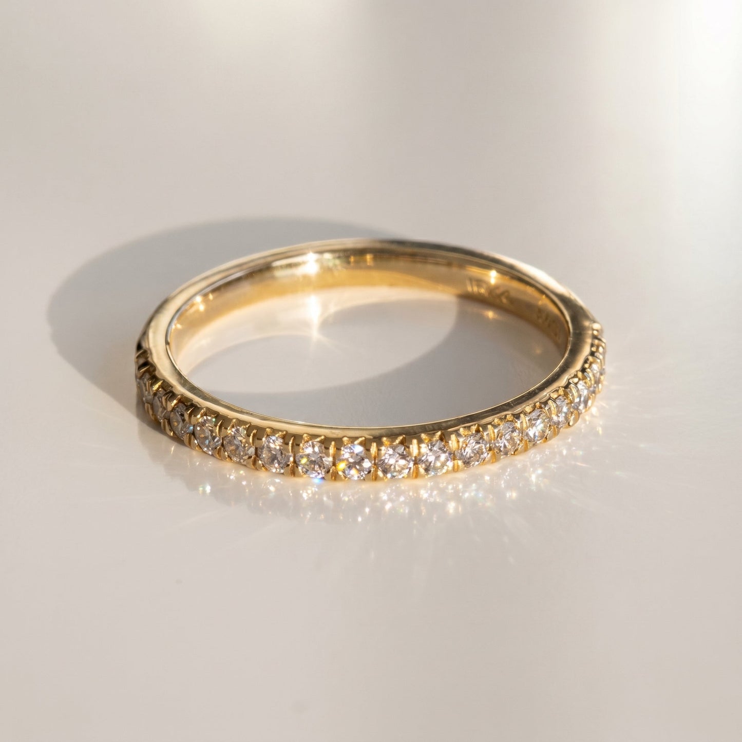 0.13 TCW Round Twisted Moissanite Wedding Band