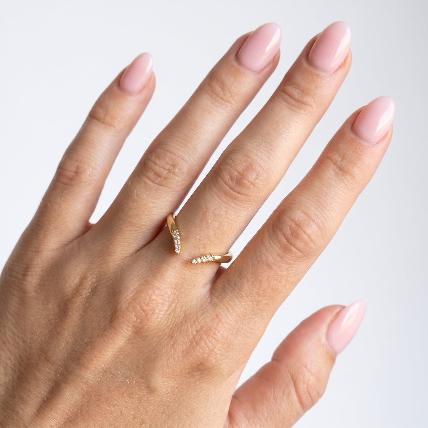 0.13 TCW Round Twisted Moissanite Wedding Band