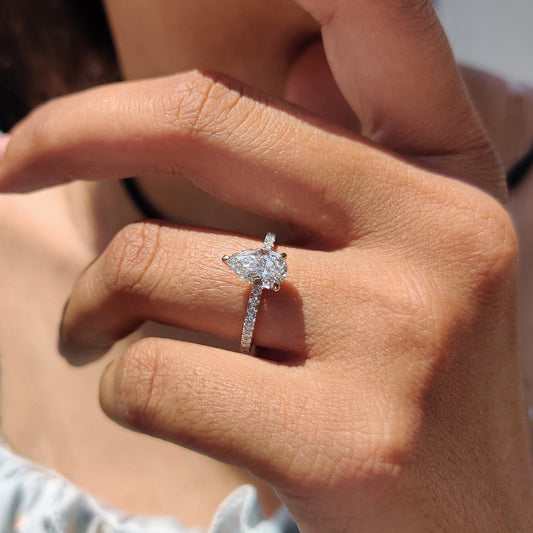 Pear Cut Engagement Ring with Hidden Halo Design
