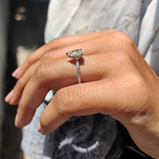 Pear Cut Engagement Ring with Hidden Halo Design
