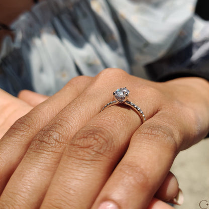 Pear Cut Engagement Ring with Hidden Halo Design