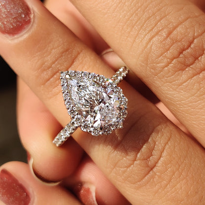 Pear Shaped Halo Engagement Ring In White Gold