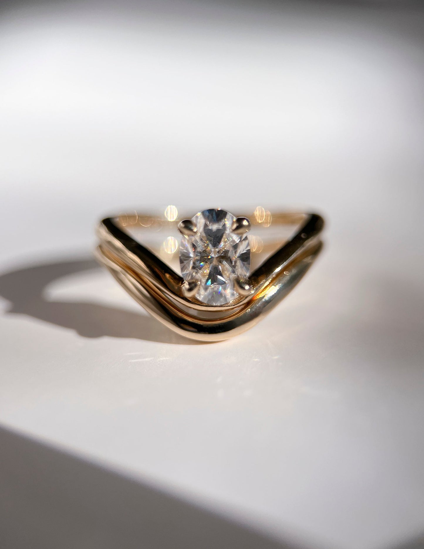 1 CT Oval Cut Solitaire Moissanite Ring With Sunrise Styled Classic Wedding Band