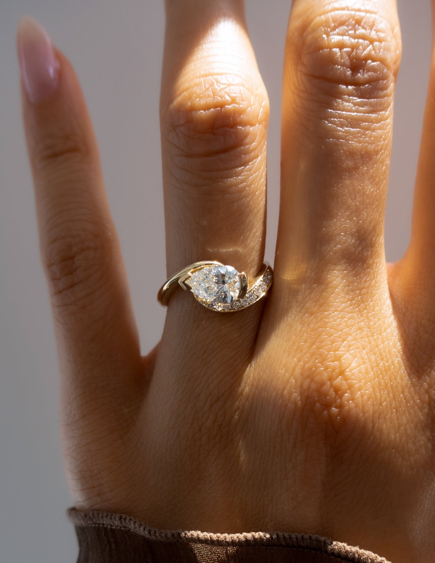 1 CT Pear Moissanite Engagement Ring with Swirl Semi Pave Design