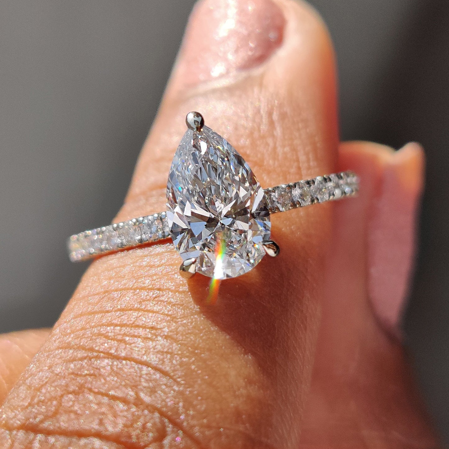 Pear Cut Engagement Ring with Hidden Halo Design