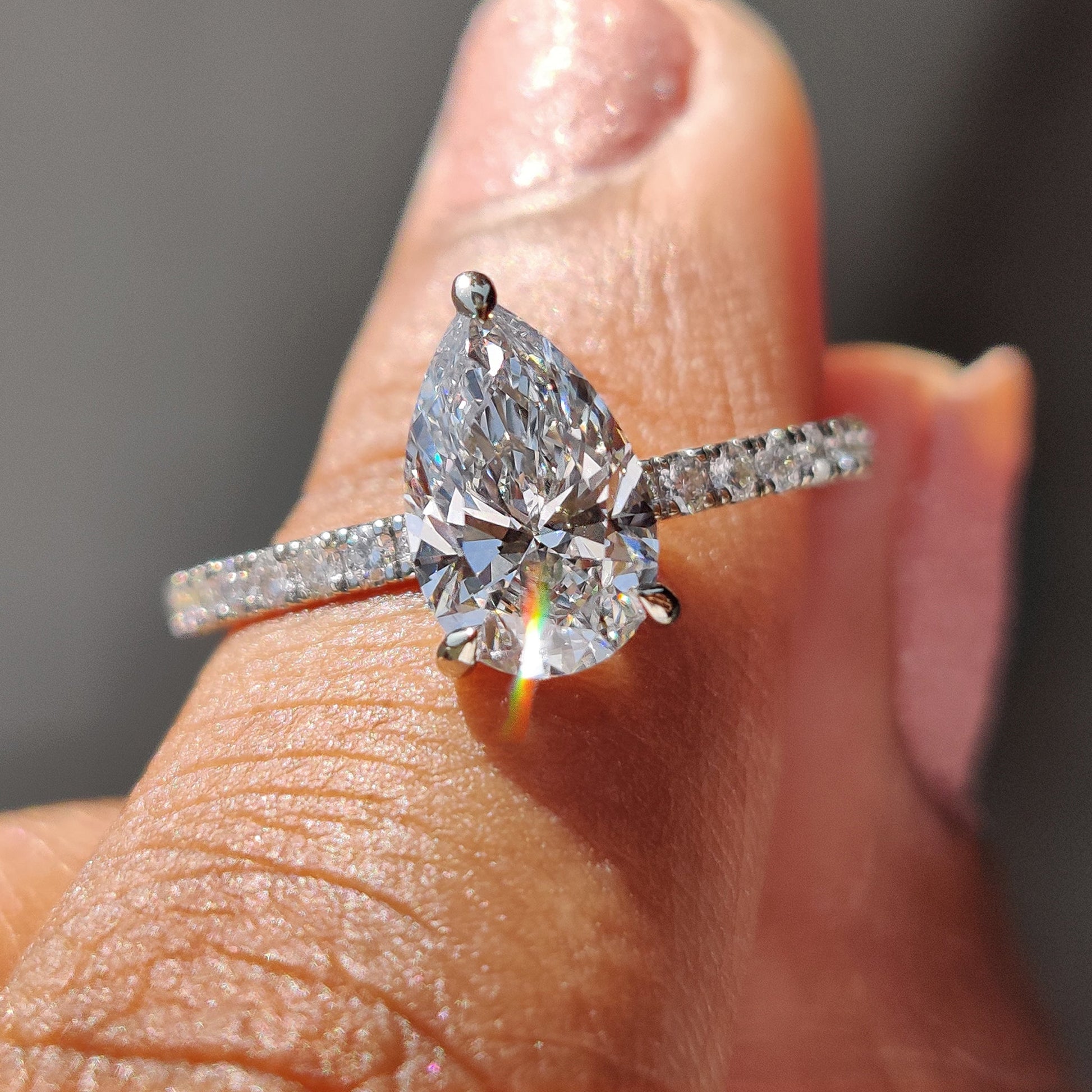 Pear Cut Engagement Ring with Hidden Halo Design