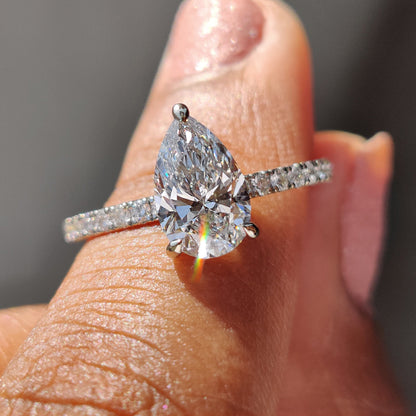Pear Cut Engagement Ring with Hidden Halo Design