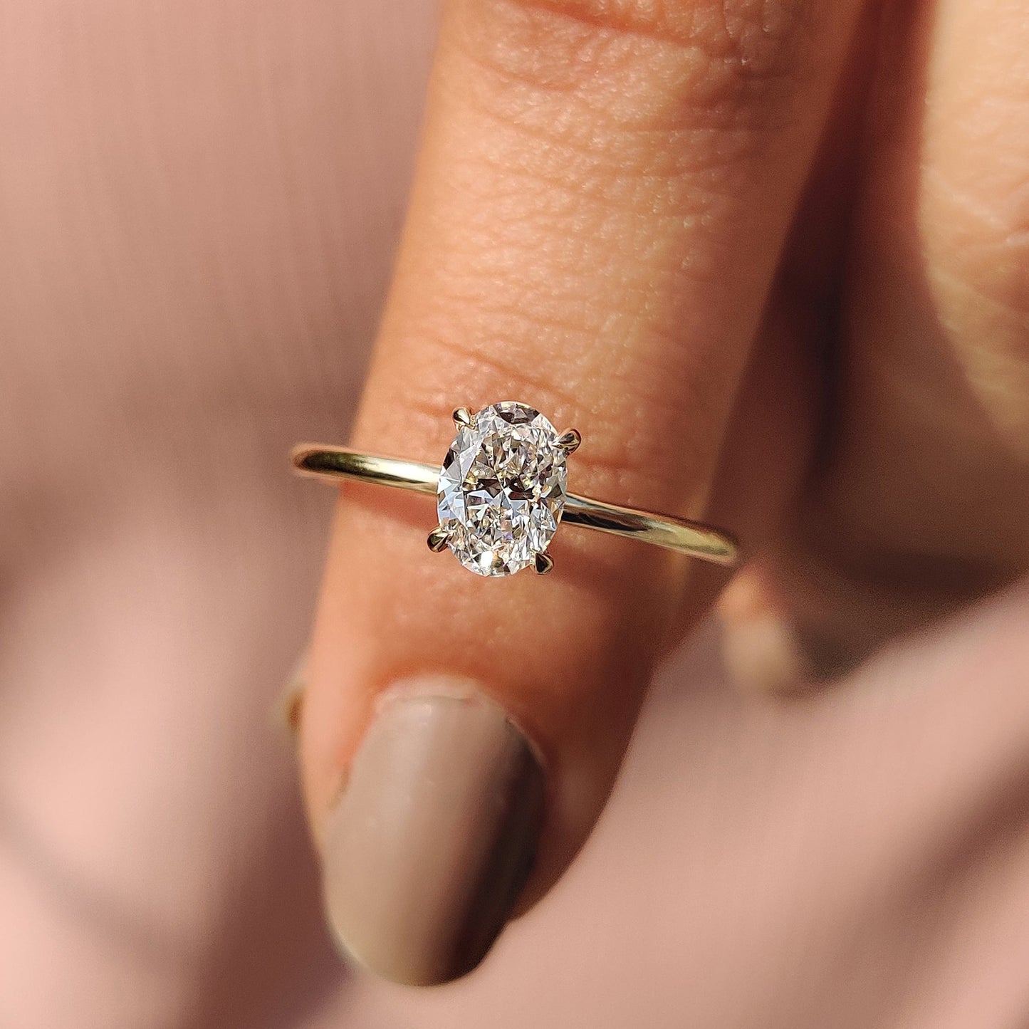 Oval Cut Diamond Ring In Solitaire Style