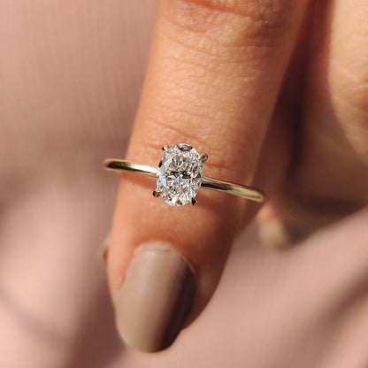 Oval Cut Diamond Ring In Solitaire Style