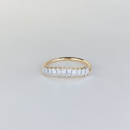 0.68 TCW Emerald Shaped Curved Moissanite Wedding Band
