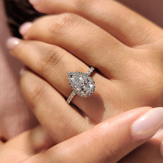 Pear Cut Halo Engagement Ring In White Gold