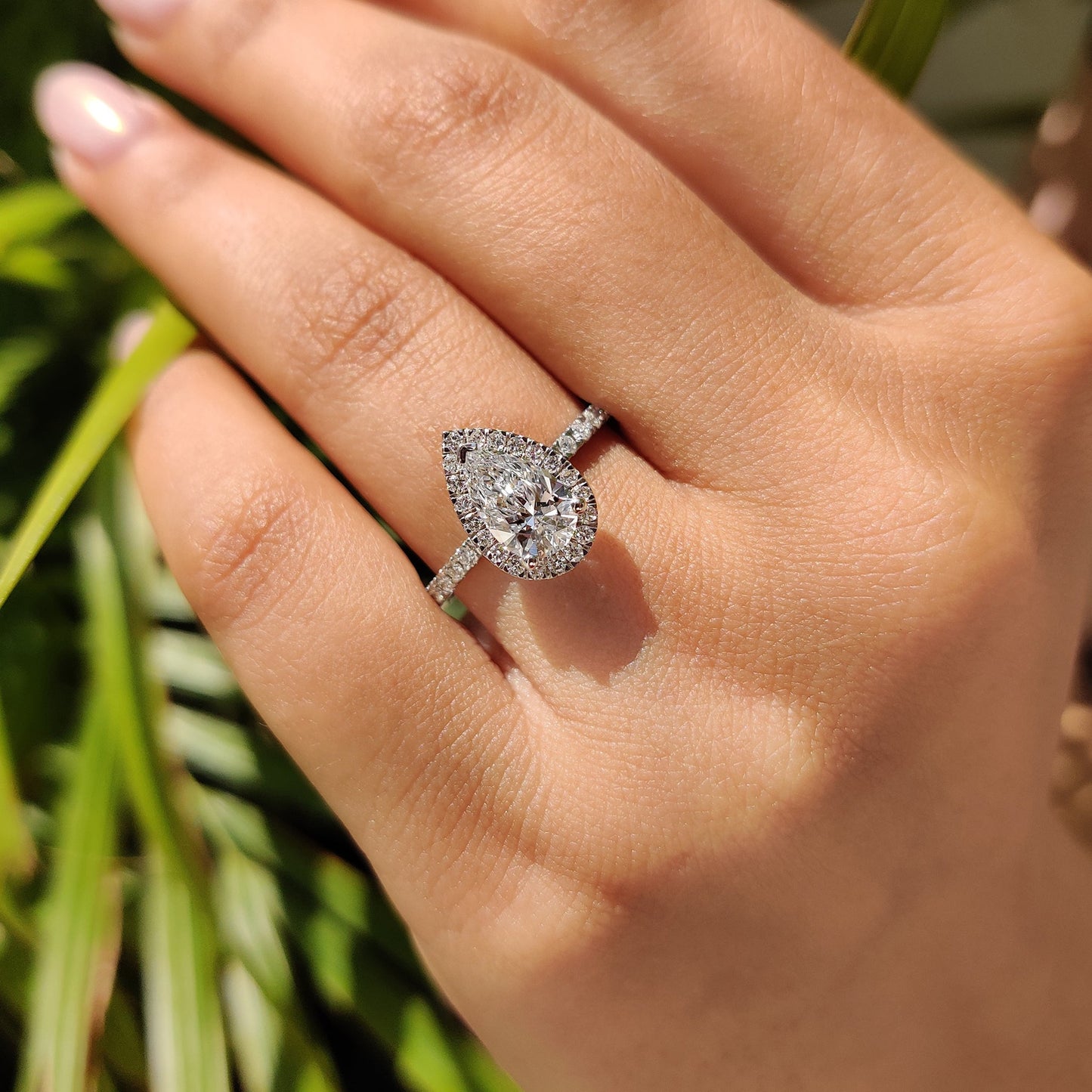 Pear Cut Halo Engagement Ring In White Gold