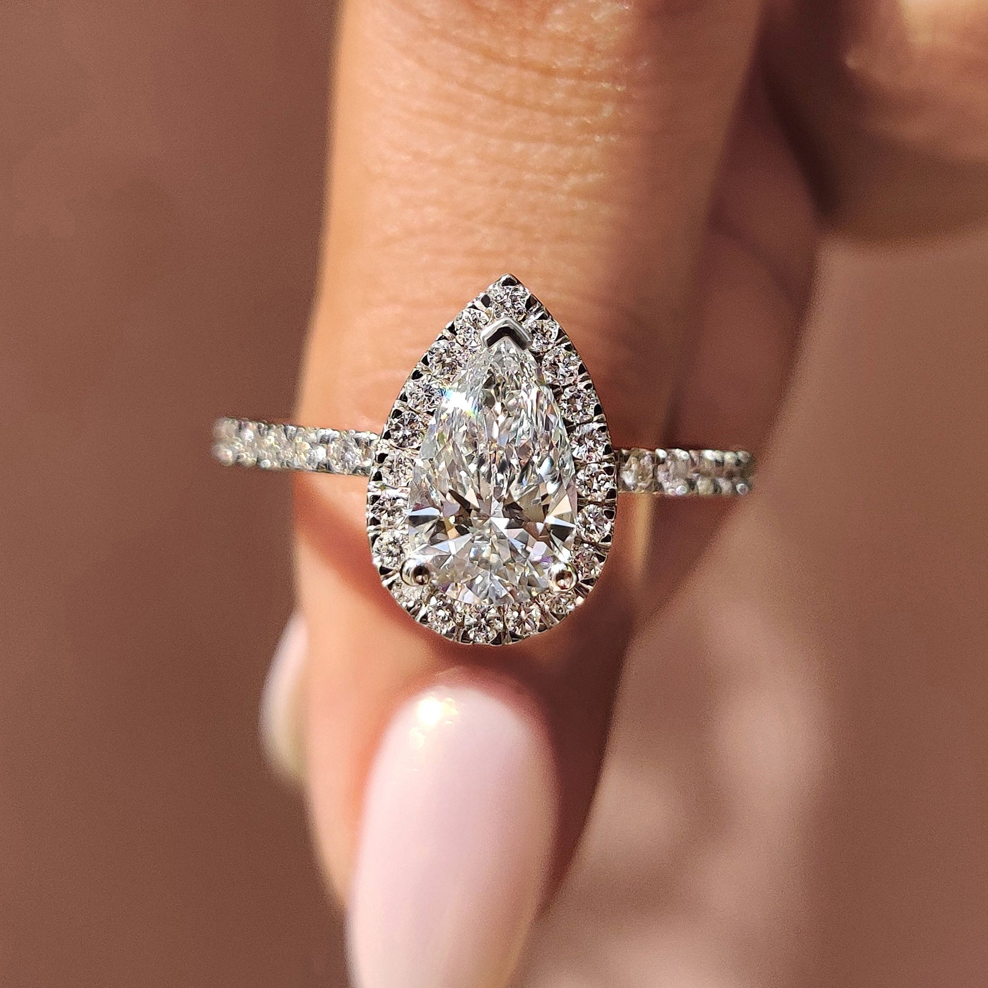Pear Cut Halo Engagement Ring In White Gold