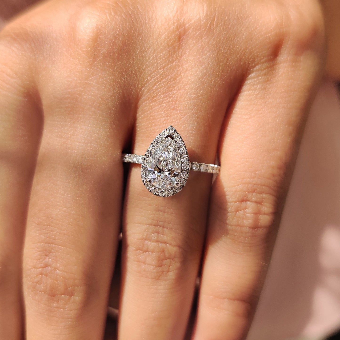 Pear Cut Halo Engagement Ring In White Gold
