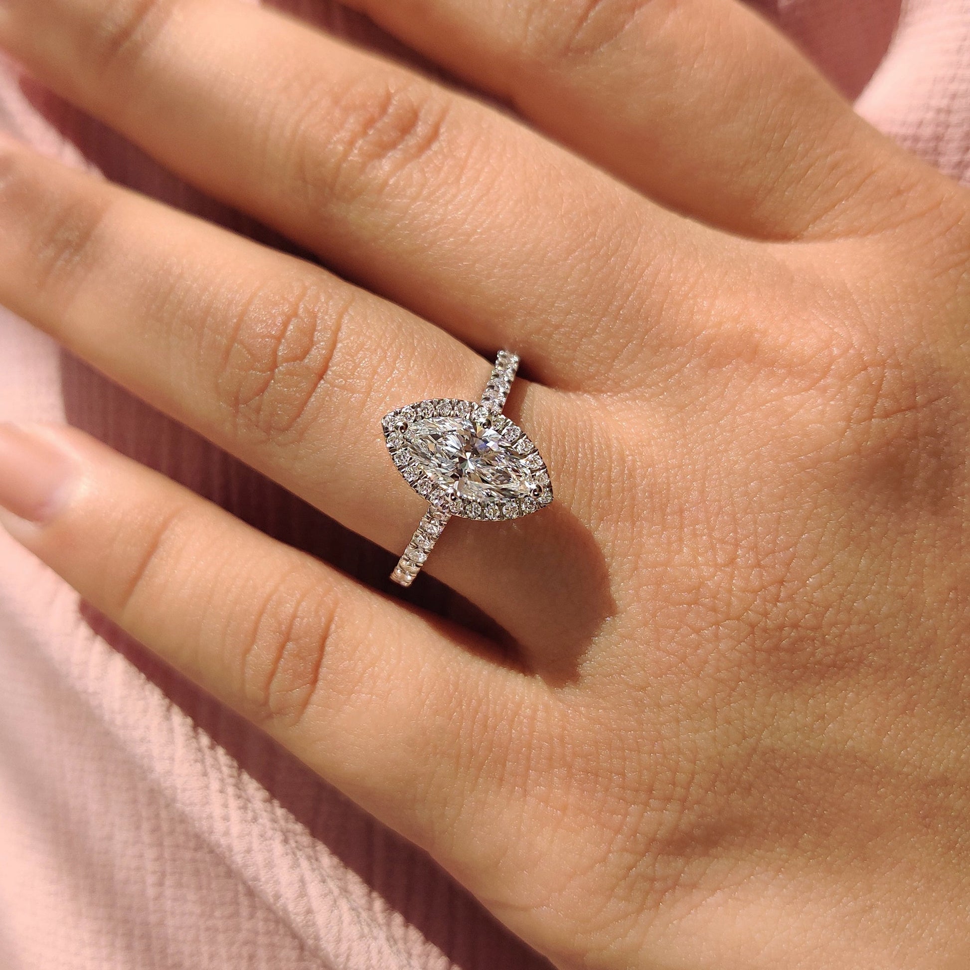 Marquise Diamond Ring With Round Cut Halo Pave Setting