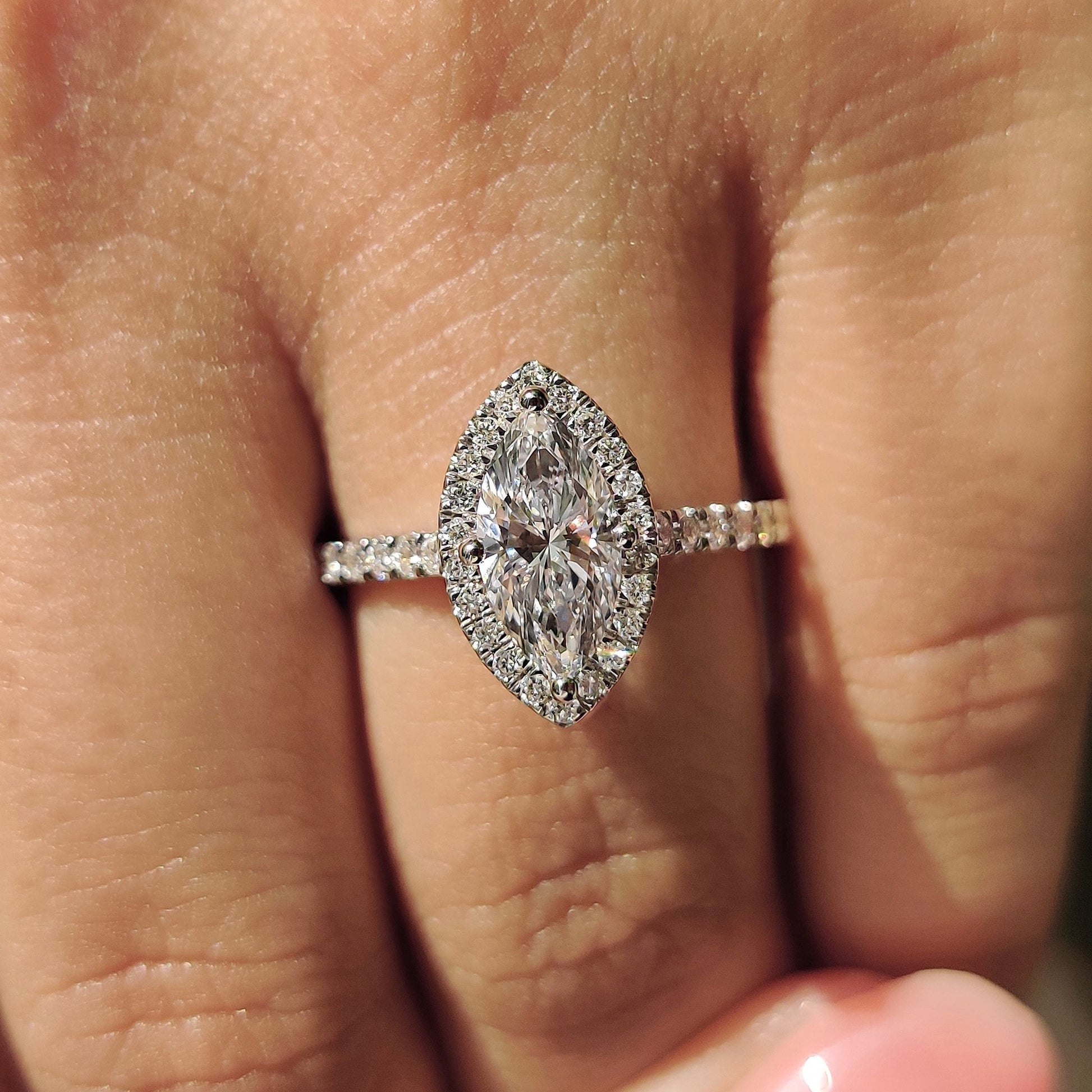 Marquise Diamond Ring With Round Cut Halo Pave Setting