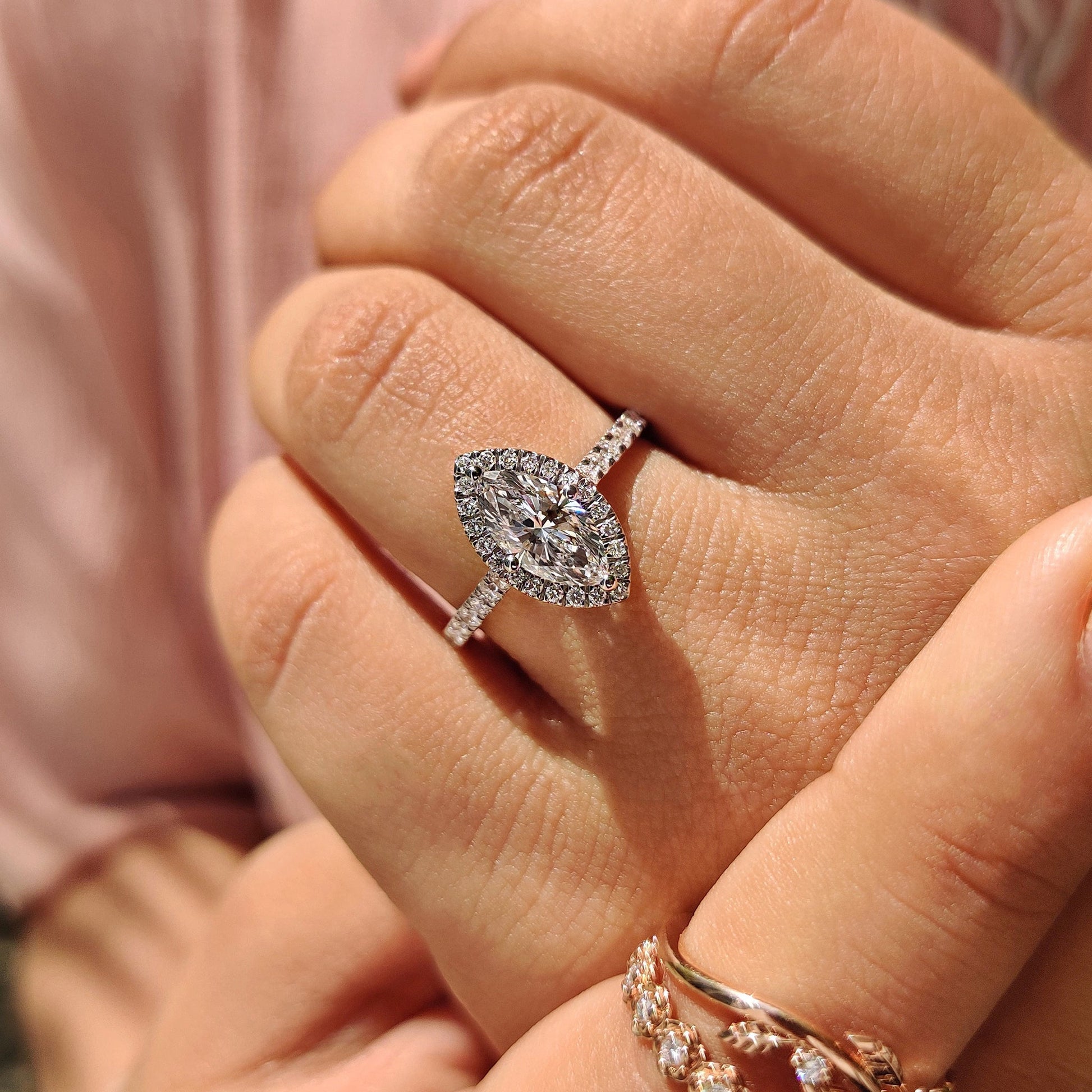 Marquise Diamond Ring With Round Cut Halo Pave Setting