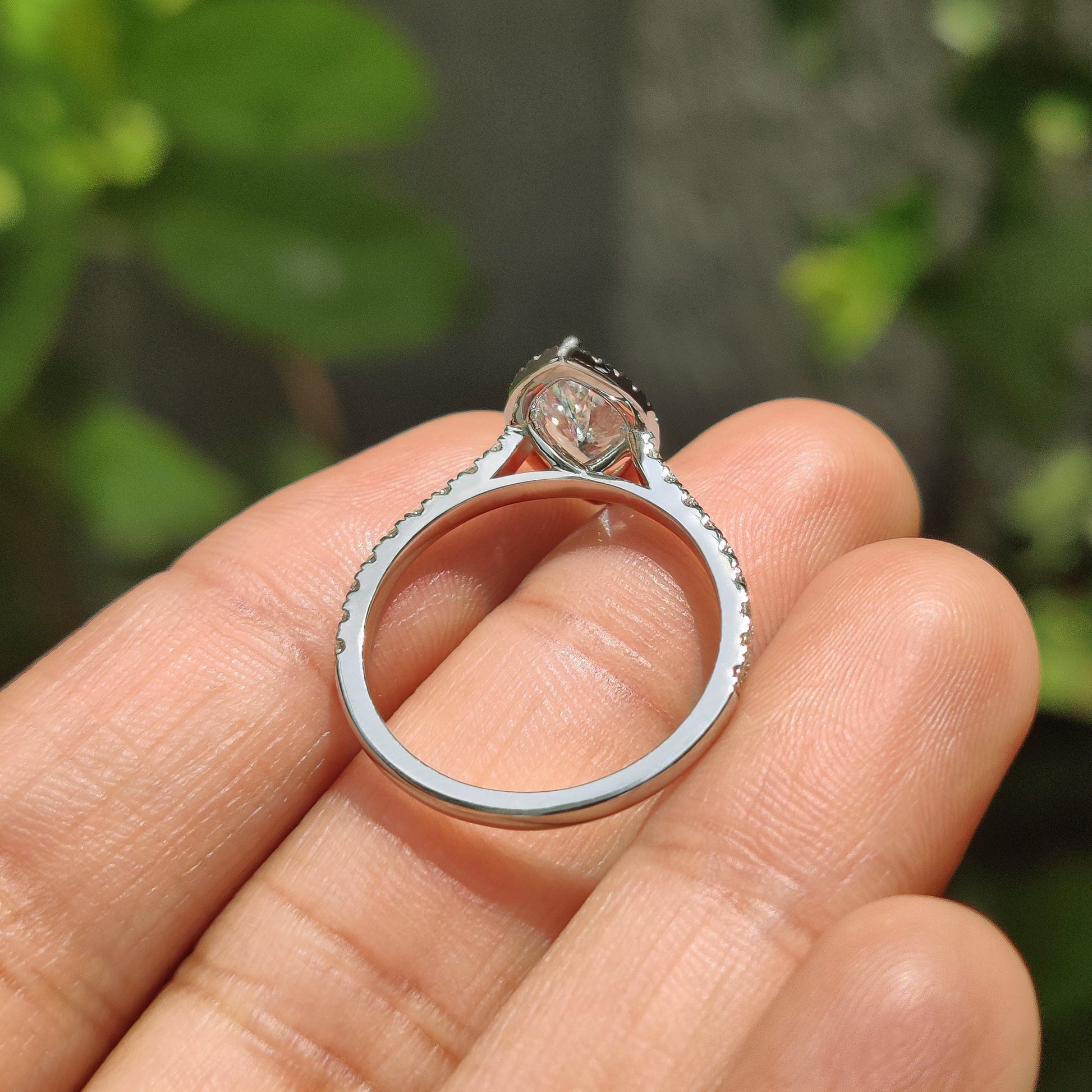 Marquise Diamond Ring With Round Cut Halo Pave Setting