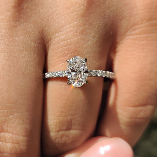 Oval Diamond Engagement Ring With Hidden Halo Setting