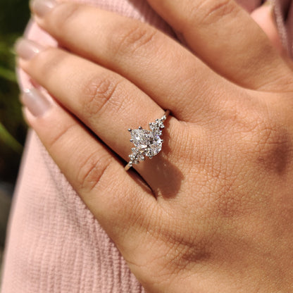Pear Cluster Diamond Ring With Round Side Stone