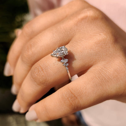 Pear Cluster Diamond Ring With Round Side Stone