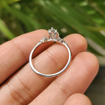 Pear Cluster Diamond Ring With Round Side Stone