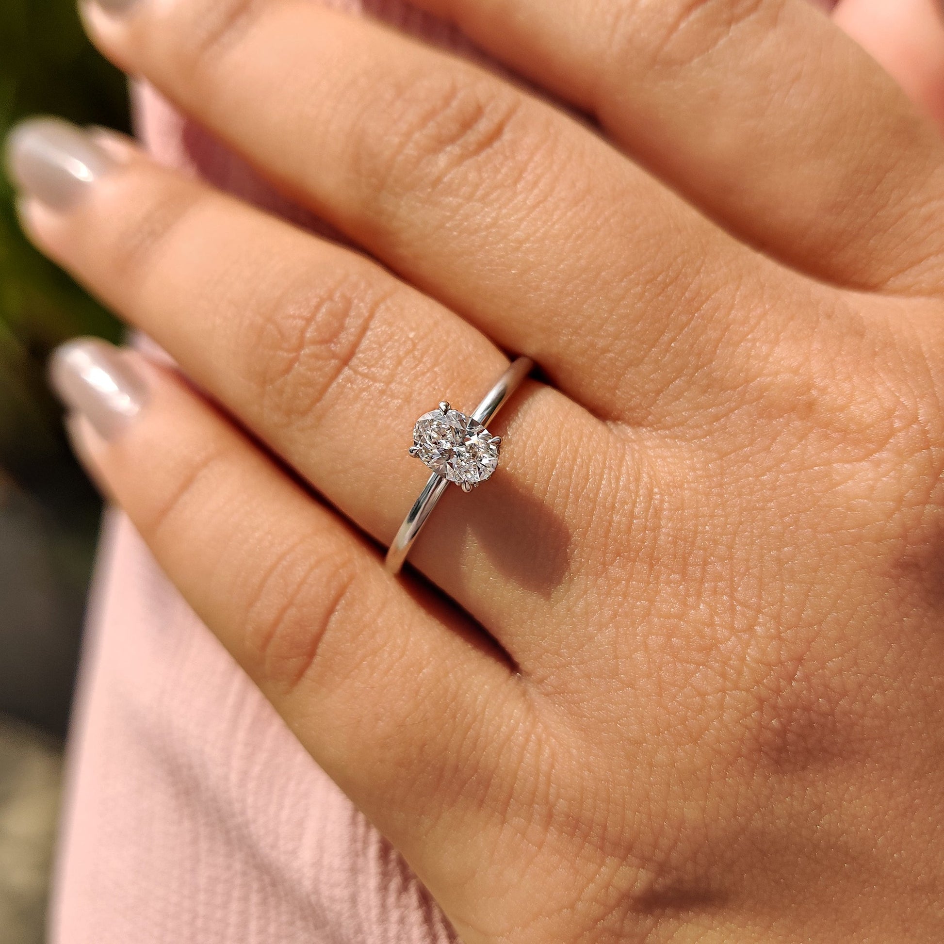 Oval Solitaire Engagement Ring With Hidden Halo