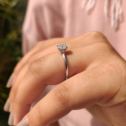 Oval Solitaire Engagement Ring With Hidden Halo