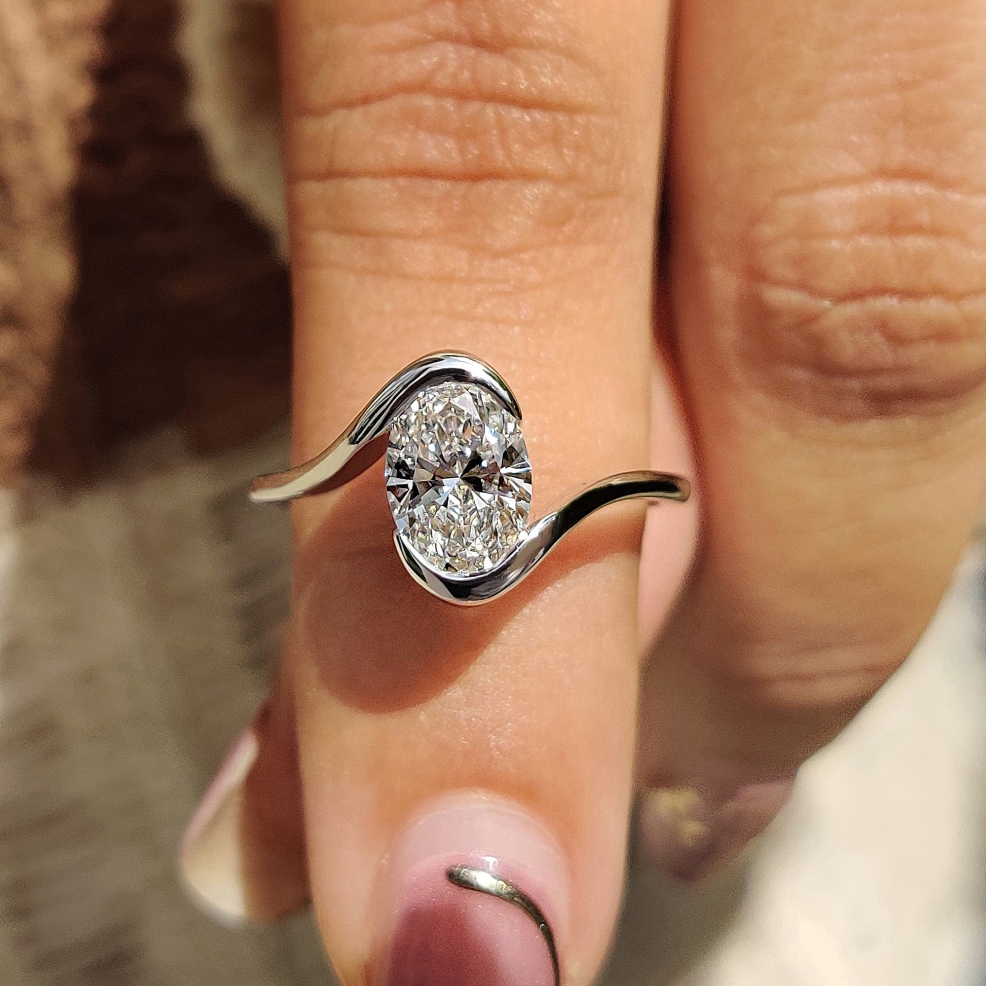 Oval Diamond Engagement Ring In Solitaire Style